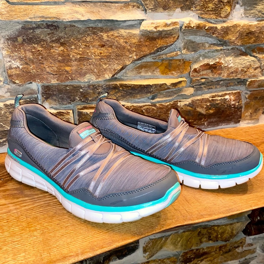 Sketchers light weight comfy memory foam shoes.